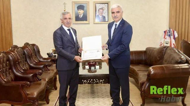 Kahramanmaraş’tan ayrılan Hasan Yiğit’e Başarı Belgesi