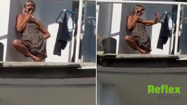 Odesa’da hasarlı binanın balkonundaki genç kadının sakinliği dikkat çekti